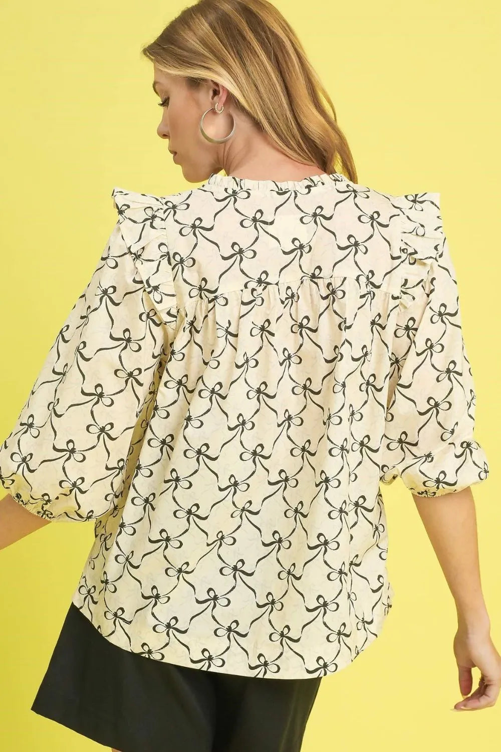 Umgee Ruffled Bow Print Notched Blouse