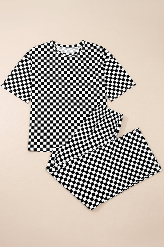 Black and white checkered shirt and pants set on a beige background