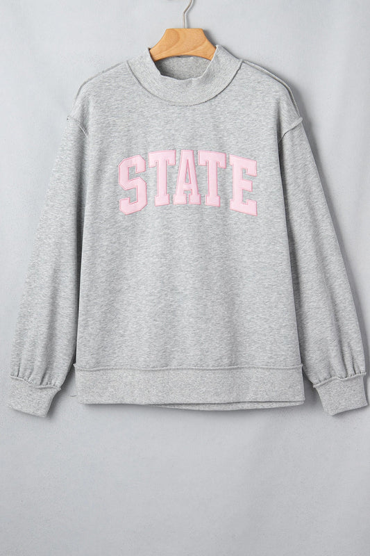 STATE Embroidered Exposed Seam Mock Neck Sweatshirt