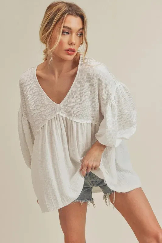 Aemi + Co High-Low Frayed Hem V-Neck Blouse