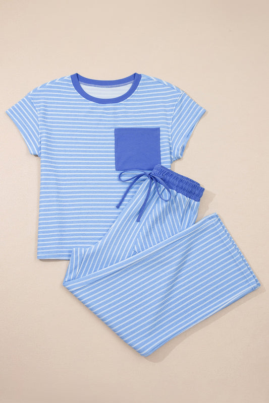 Blue striped pajama set on a beige background