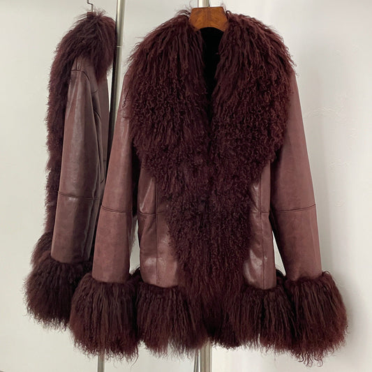 Brown leather coat with fur trim on a white background