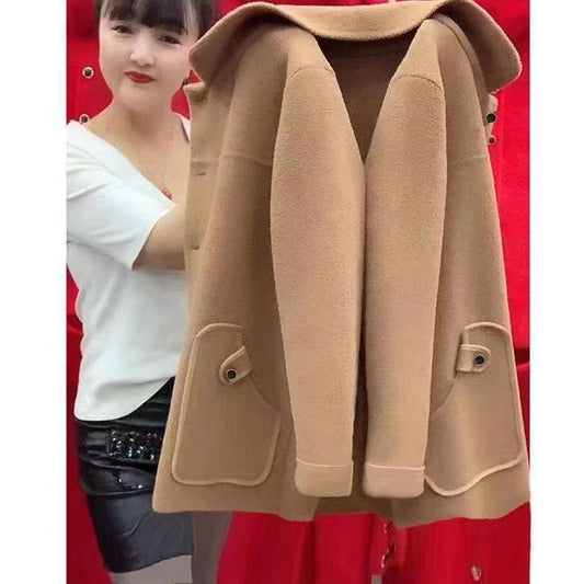Beige coat displayed against a red background