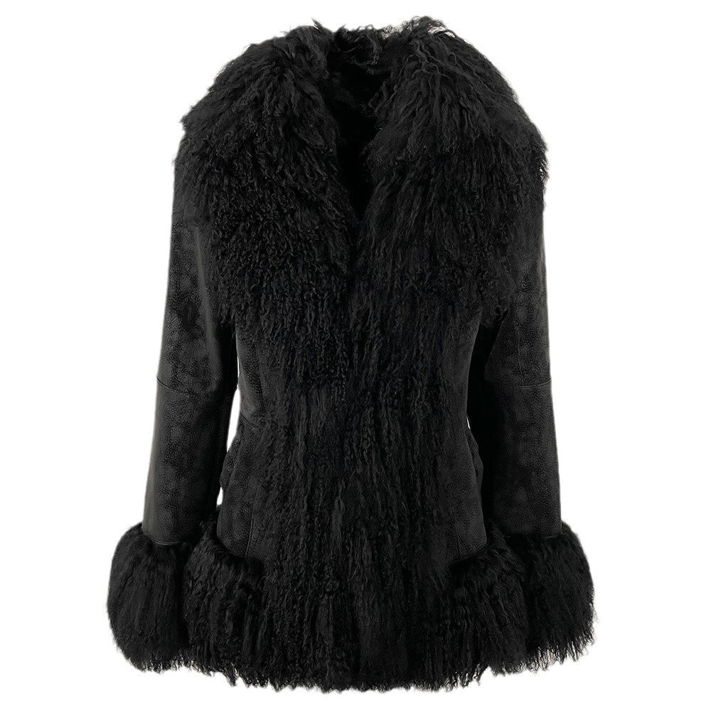 Black fur coat with frayed edges on a white background