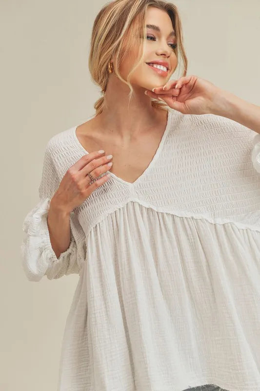 Aemi + Co High-Low Frayed Hem V-Neck Blouse