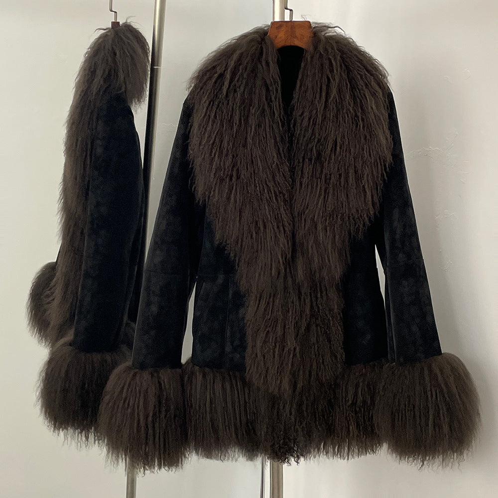 Dark brown fur coat with matching fur trim on a mannequin against a white background